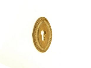 Sleutelplaat ovaal brons antiek 32mm gegoten